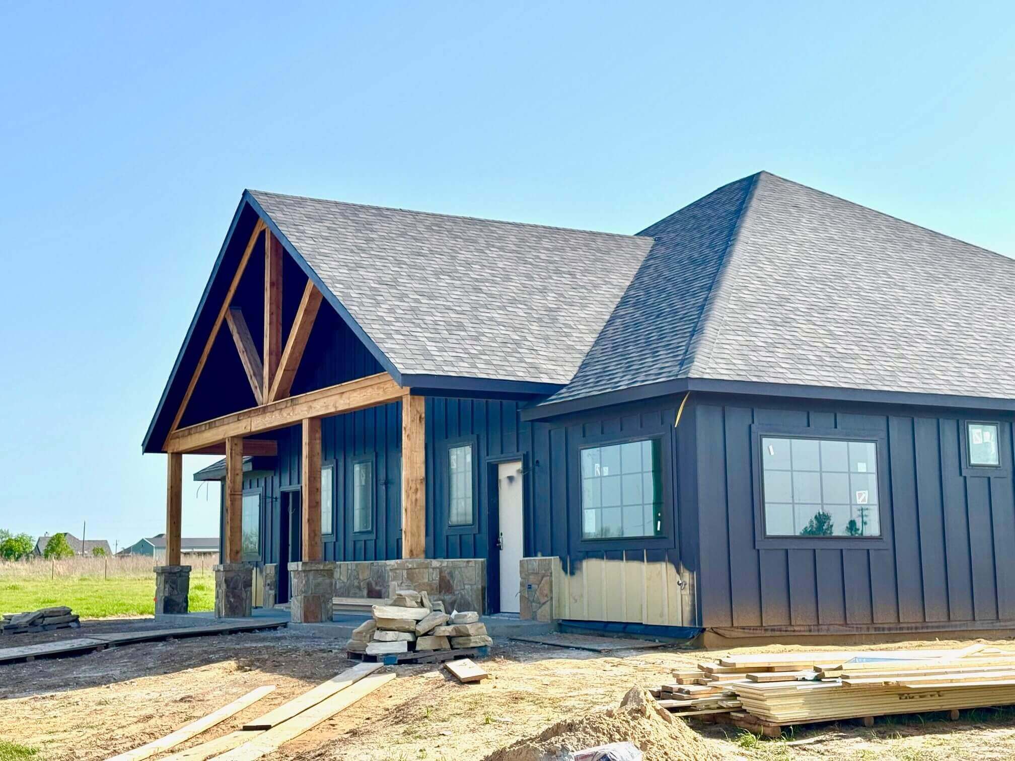Gabled house with timber porch under construction